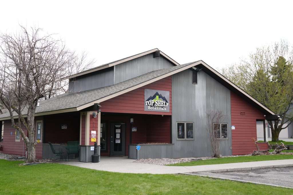 Exterior view of the best dispensary in Bozeman, Top Shelf Botanicals, showcasing the store front and inviting entrance.