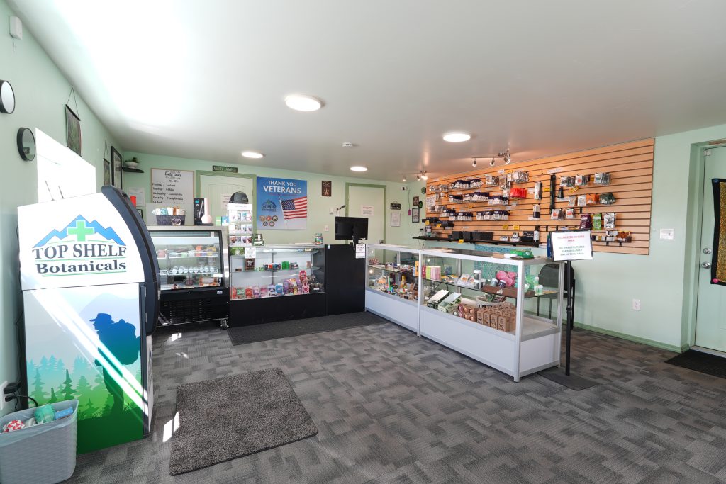 Interior of Three Forks dispensary, featuring premium cannabis products like flower, concentrates, edibles, and accessories.