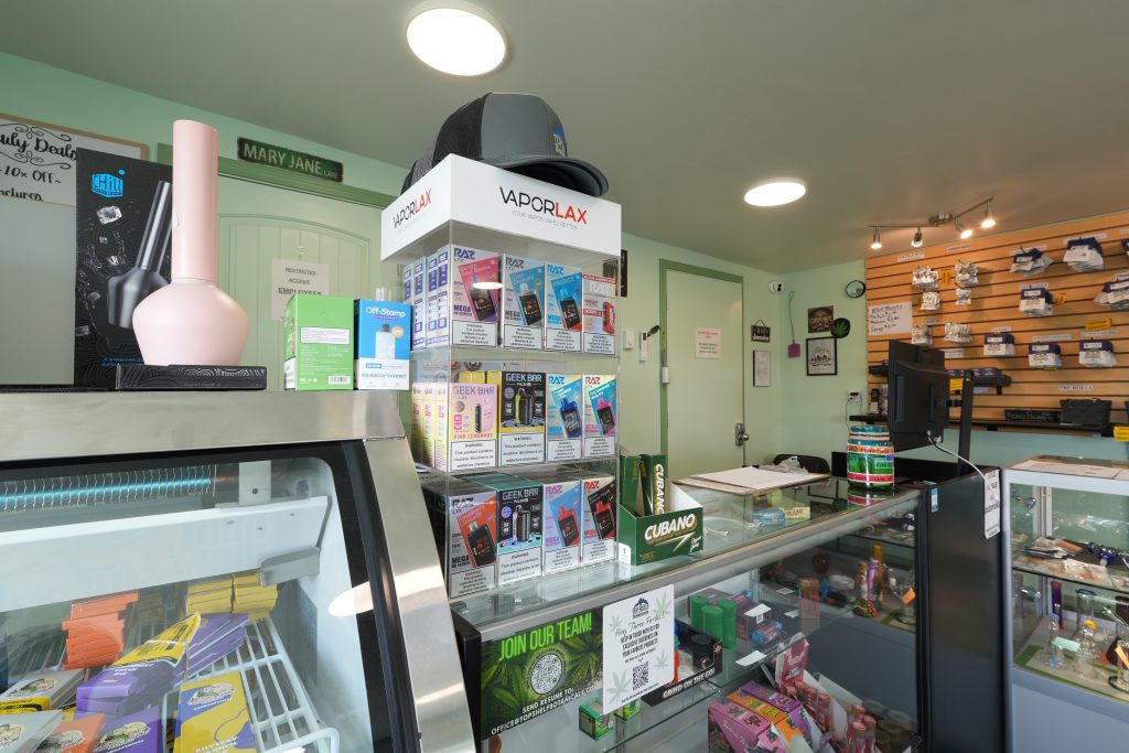 Interior of Three Forks dispensary, featuring premium cannabis products like flower, concentrates, edibles, and accessories.