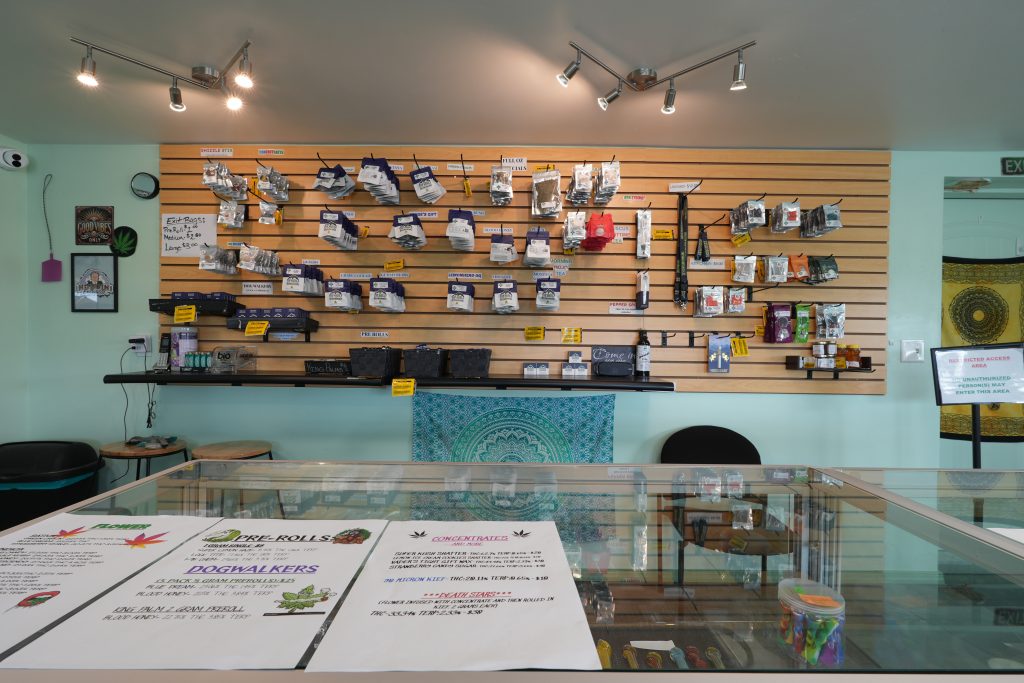 Interior of Three Forks dispensary, featuring premium cannabis products like flower, concentrates, edibles, and accessories.