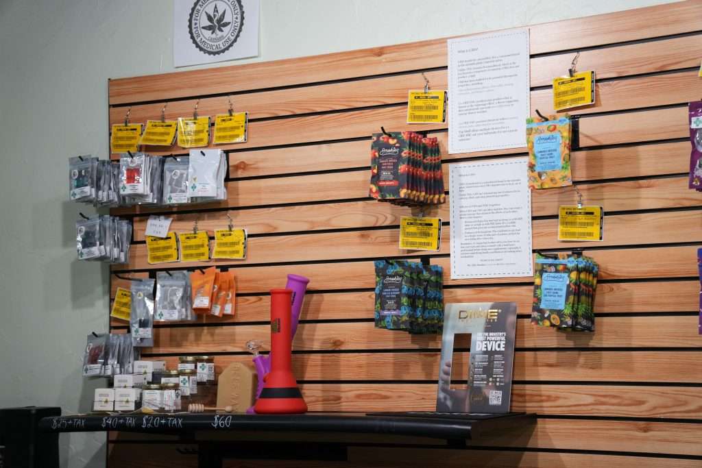 Interior of dispensary in Ennis MT Top Shelf Botanicals, featuring premium cannabis products like flower, concentrates, edibles, and accessories.