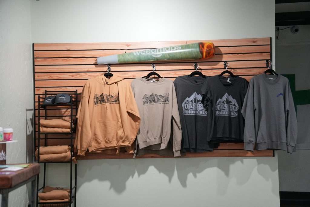 Interior of dispensary in Ennis MT Top Shelf Botanicals, featuring premium cannabis products like flower, concentrates, edibles, and accessories.