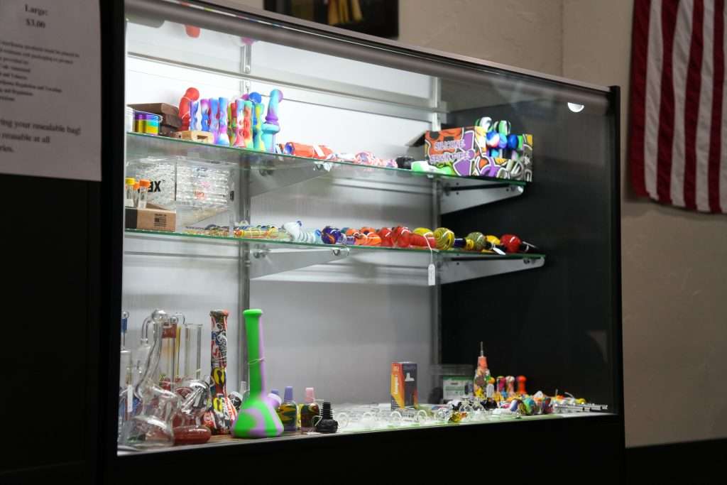 Interior of dispensary in Ennis MT Top Shelf Botanicals, featuring premium cannabis products like flower, concentrates, edibles, and accessories.