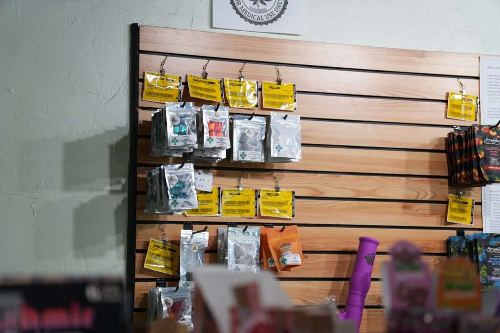 Interior of dispensary in Ennis MT Top Shelf Botanicals, featuring premium cannabis products like flower, concentrates, edibles, and accessories.