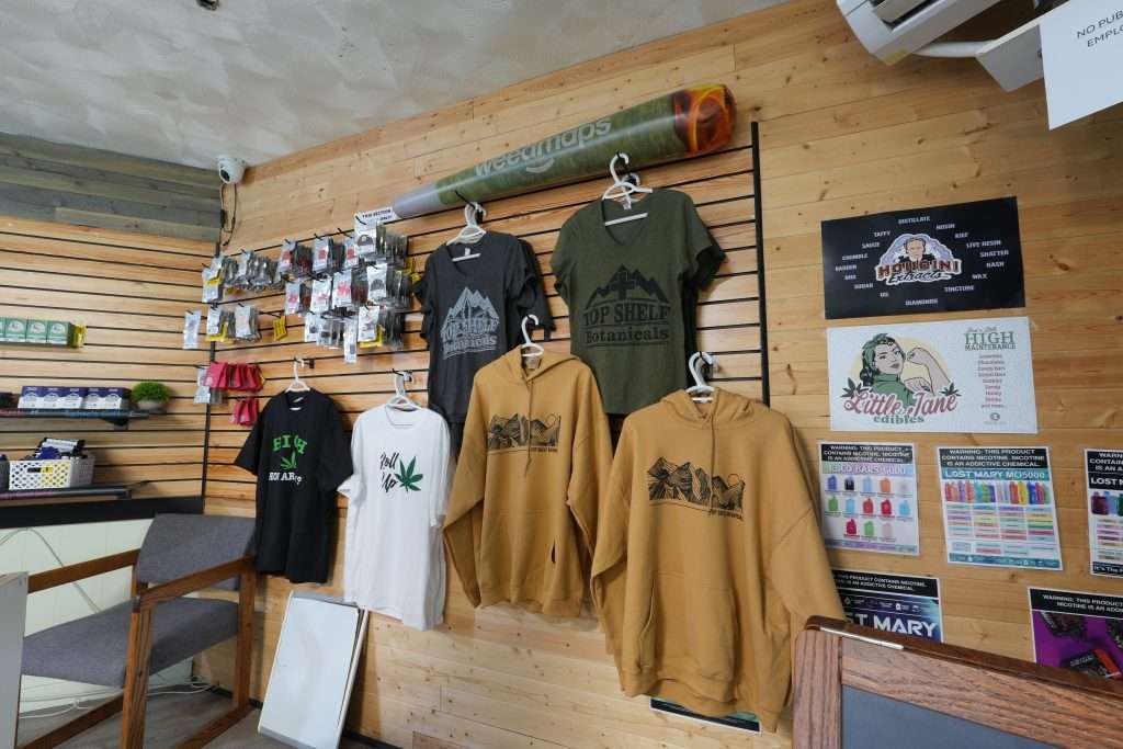 Interior of Sheridan dispensary, featuring premium cannabis products like flower, concentrates, edibles, and accessories.
