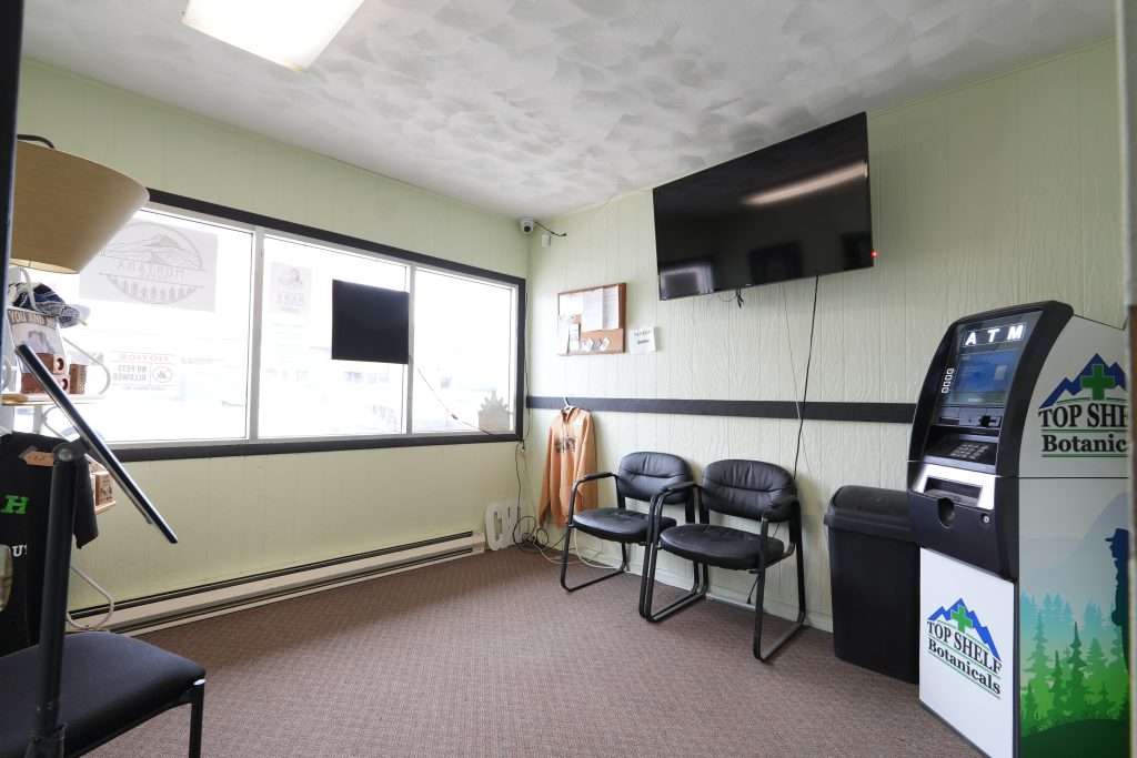 Interior of Sheridan dispensary, featuring premium cannabis products like flower, concentrates, edibles, and accessories.