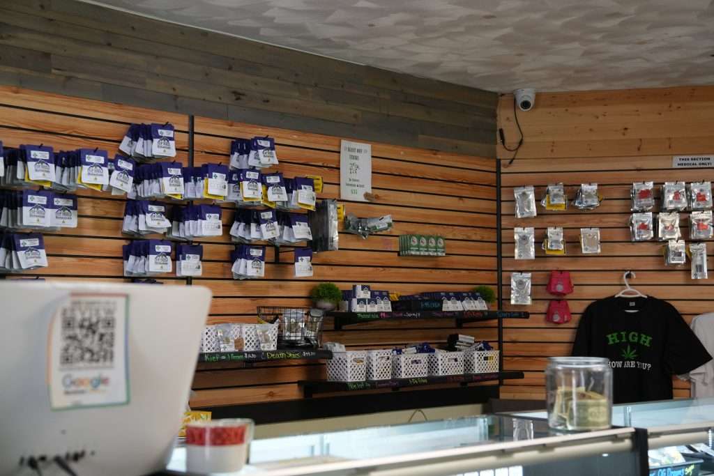 Interior of Sheridan dispensary, featuring premium cannabis products like flower, concentrates, edibles, and accessories.