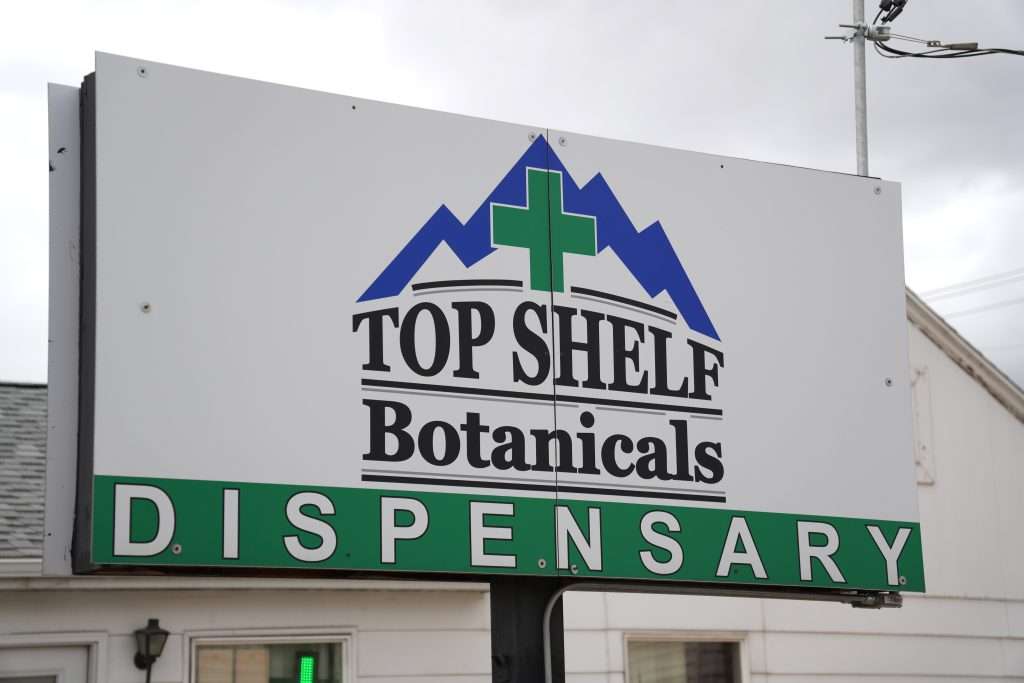 Exterior view of the dispensary in Butte MT, Top Shelf Botanicals, showcasing the store front and inviting entrance.