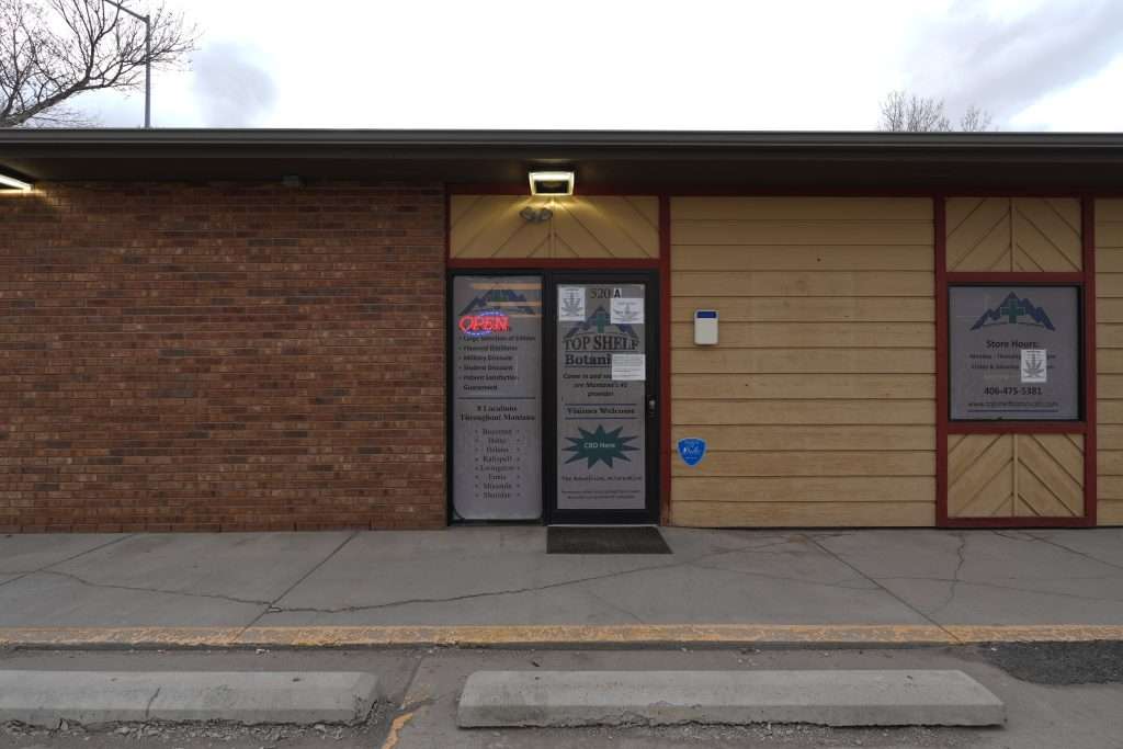 Exterior view of the dispensary in Helena MT, Top Shelf Botanicals, showcasing the store front and welcoming entrance.
