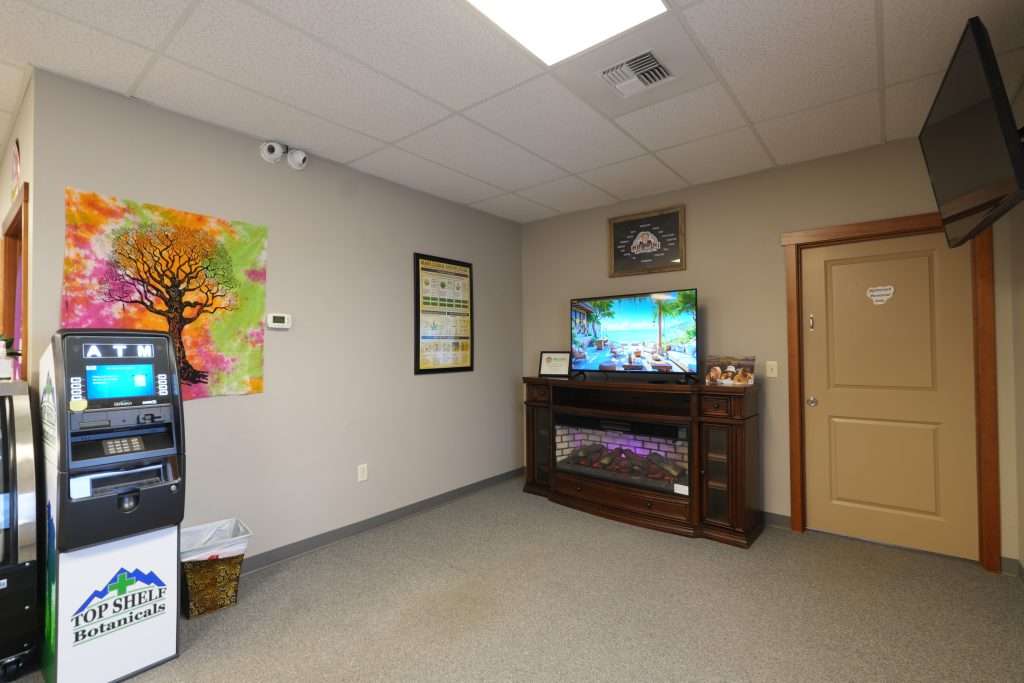 Interior of dispensary in Helena MT, Top Shelf Botanicals, featuring premium cannabis products like flower, concentrates, edibles, and accessories.