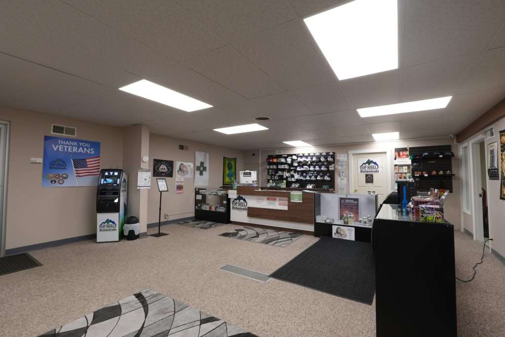 Interior of the best dispensary in Great Falls, Top Shelf Botanicals, featuring premium cannabis products like flower, concentrates, edibles, and accessories.