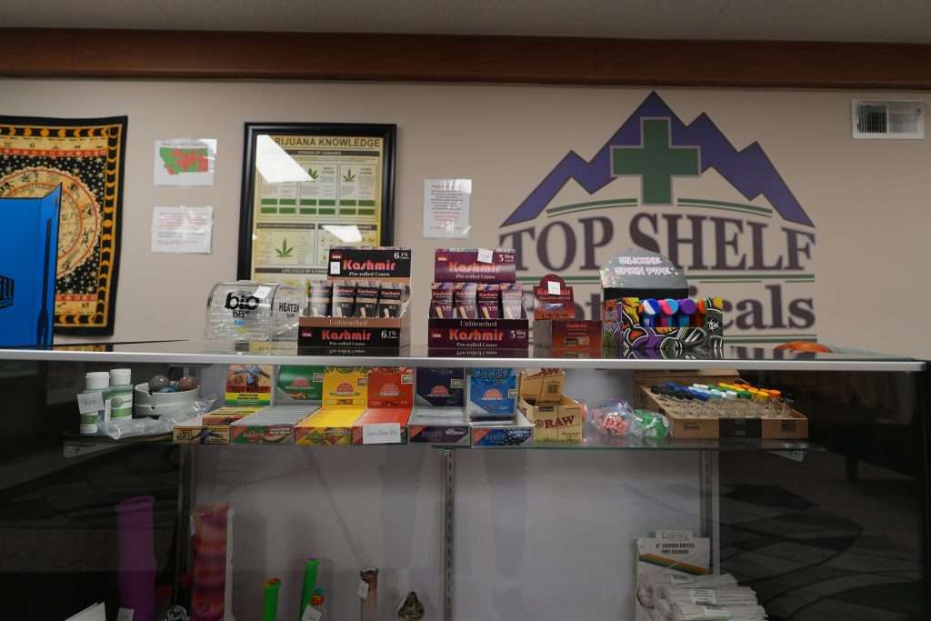 Interior of the best dispensary in Great Falls, Top Shelf Botanicals, featuring premium cannabis products like flower, concentrates, edibles, and accessories.