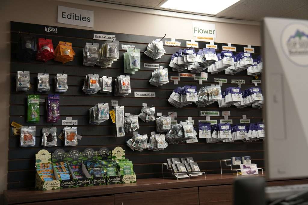 Interior of the best dispensary in Great Falls, Top Shelf Botanicals, featuring premium cannabis products like flower, concentrates, edibles, and accessories.