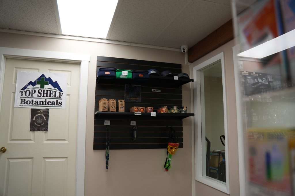 Interior of the best dispensary in Great Falls, Top Shelf Botanicals, featuring premium cannabis products like flower, concentrates, edibles, and accessories.