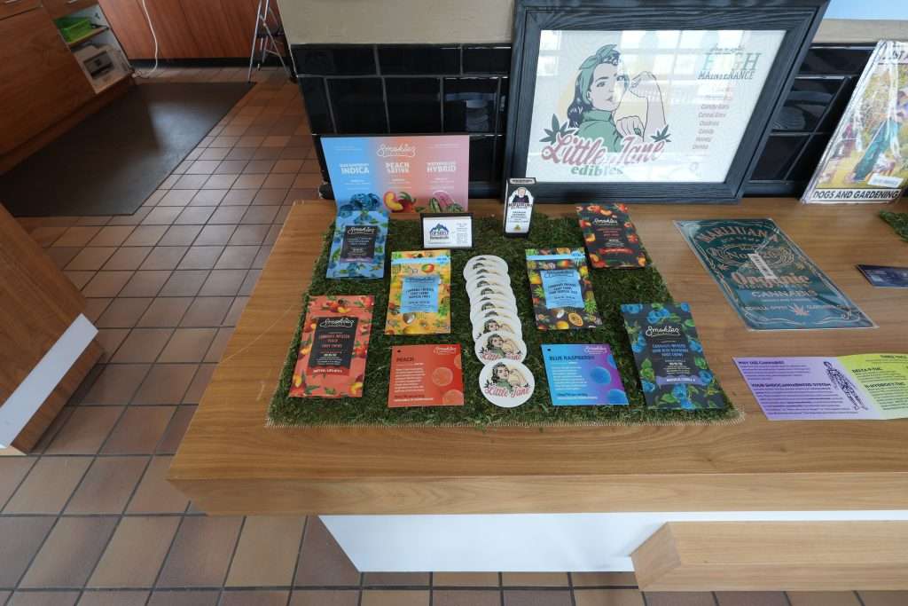 Interior of Missoula dispensary on Broadway, featuring premium cannabis products like flower, concentrates, edibles, and accessories.
