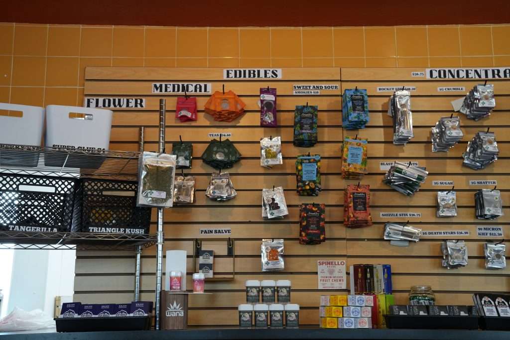 Interior of Missoula dispensary on Broadway, featuring premium cannabis products like flower, concentrates, edibles, and accessories.