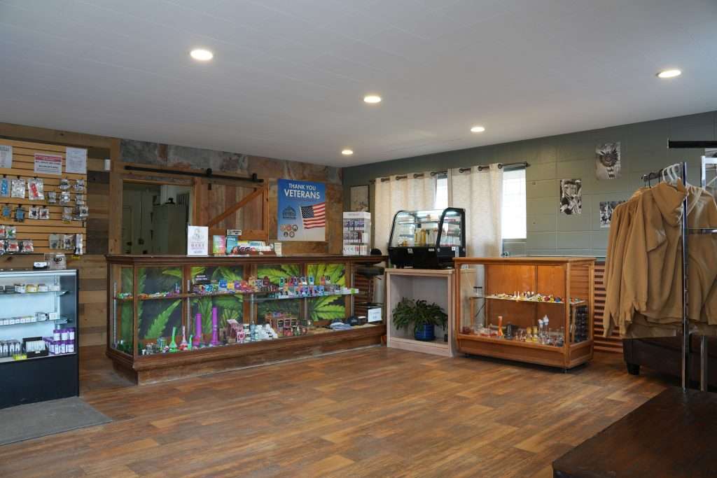 Interior of Arlee dispensary, featuring premium cannabis products like flower, concentrates, edibles, and accessories.