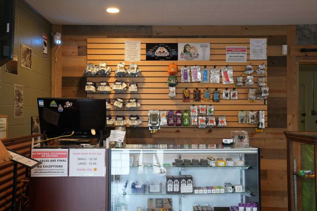 Interior of Arlee dispensary, featuring premium cannabis products like flower, concentrates, edibles, and accessories.