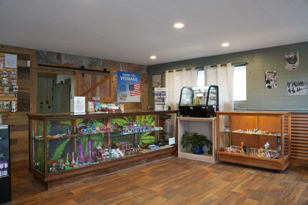 Interior of Arlee dispensary, featuring premium cannabis products like flower, concentrates, edibles, and accessories.