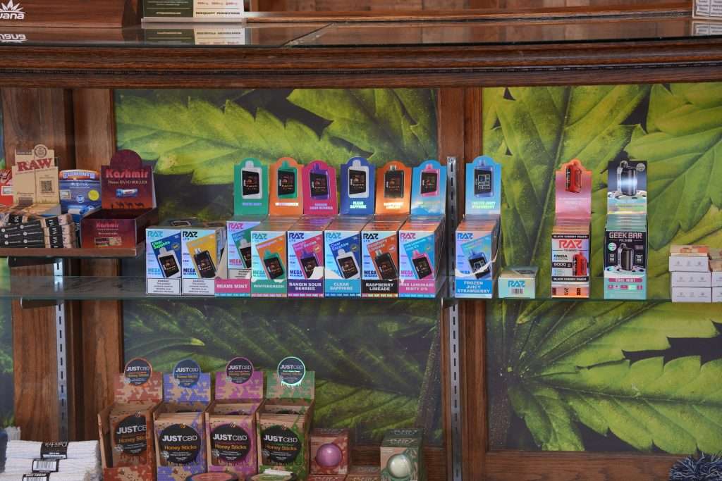 Interior of Arlee dispensary, featuring premium cannabis products like flower, concentrates, edibles, and accessories.