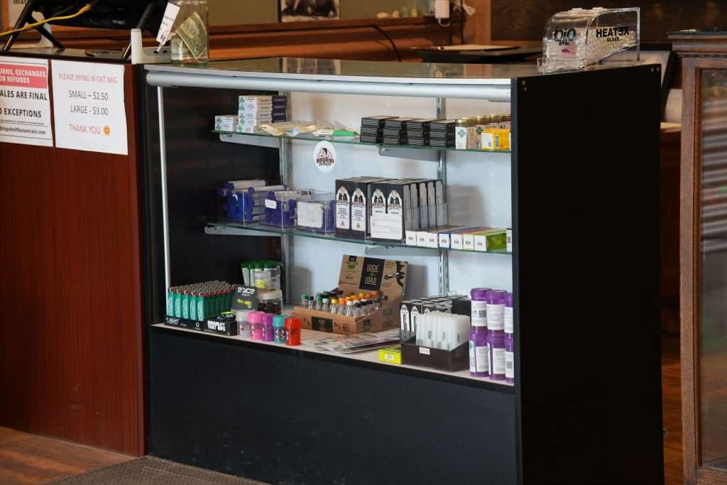 Interior of Arlee dispensary, featuring premium cannabis products like flower, concentrates, edibles, and accessories.