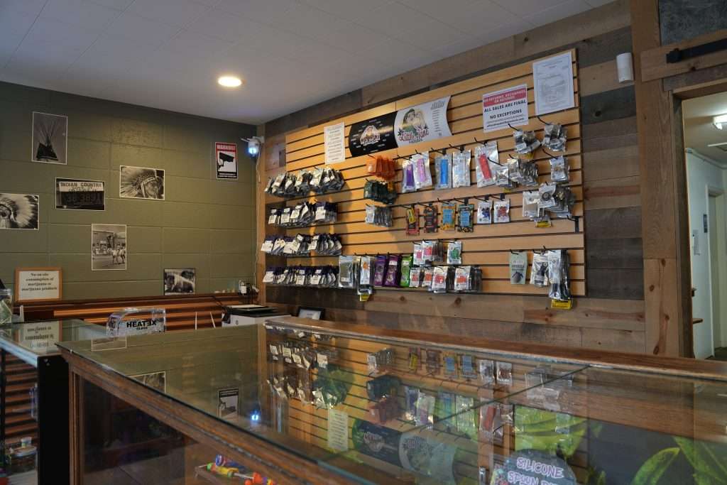 Interior of Arlee dispensary, featuring premium cannabis products like flower, concentrates, edibles, and accessories.