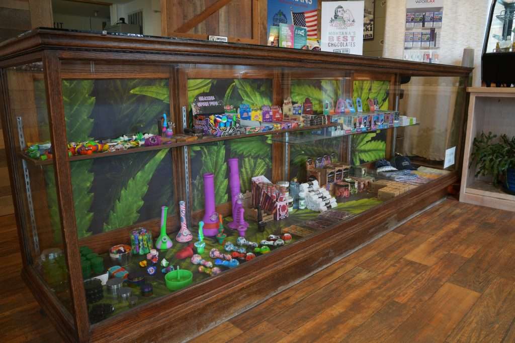 Interior of Arlee dispensary, featuring premium cannabis products like flower, concentrates, edibles, and accessories.