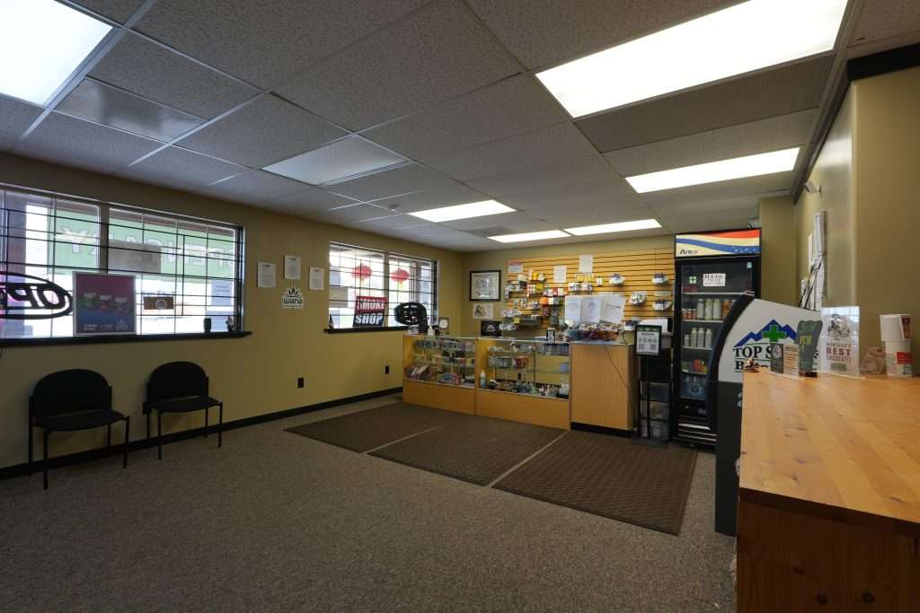 Interior of Plains dispensary, featuring premium cannabis products like flower, concentrates, edibles, and accessories.