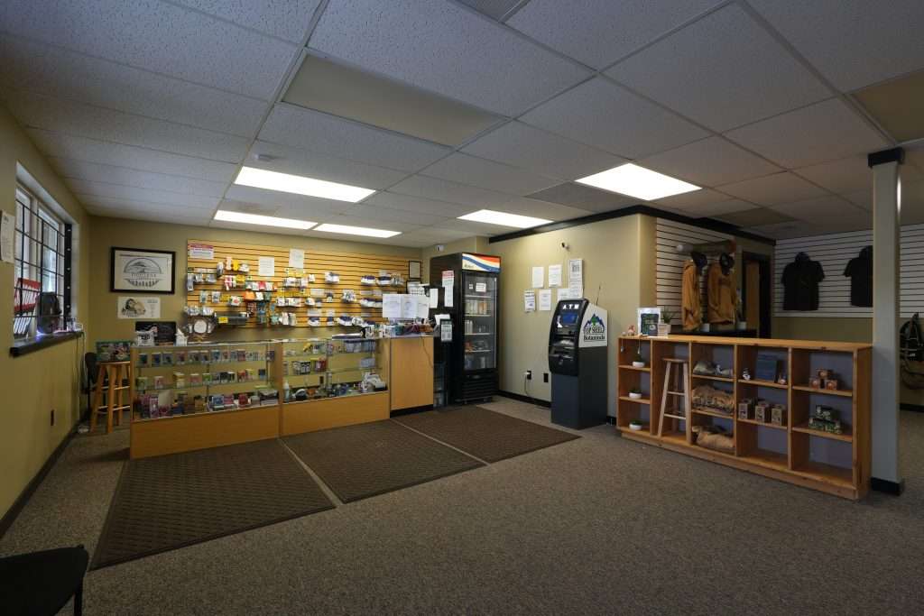Interior of Plains dispensary, featuring premium cannabis products like flower, concentrates, edibles, and accessories.