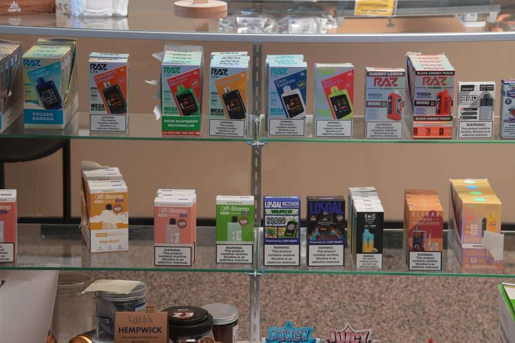 Interior of Plains dispensary, featuring premium cannabis products like flower, concentrates, edibles, and accessories.