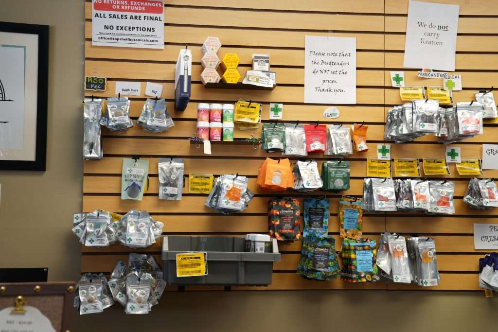 Interior of Plains dispensary, featuring premium cannabis products like flower, concentrates, edibles, and accessories.