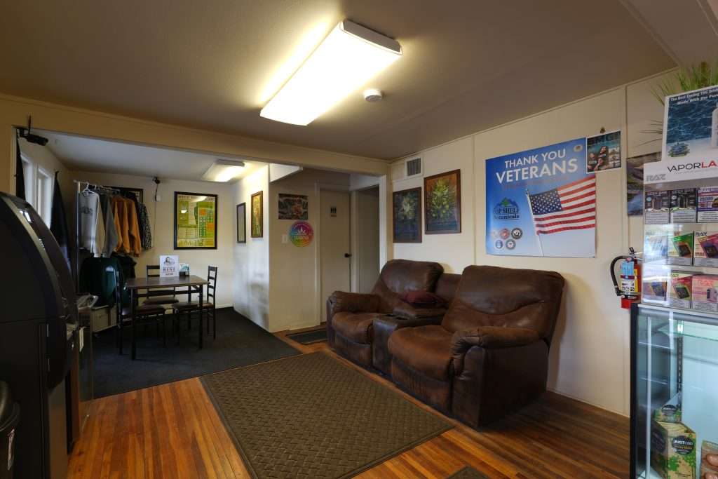Interior of dispensary in Kalispell, MT, featuring premium cannabis products like flower, concentrates, edibles, and accessories.