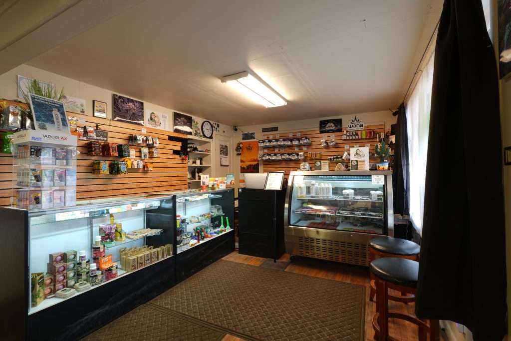 Interior of dispensary in Kalispell, MT, featuring premium cannabis products like flower, concentrates, edibles, and accessories.