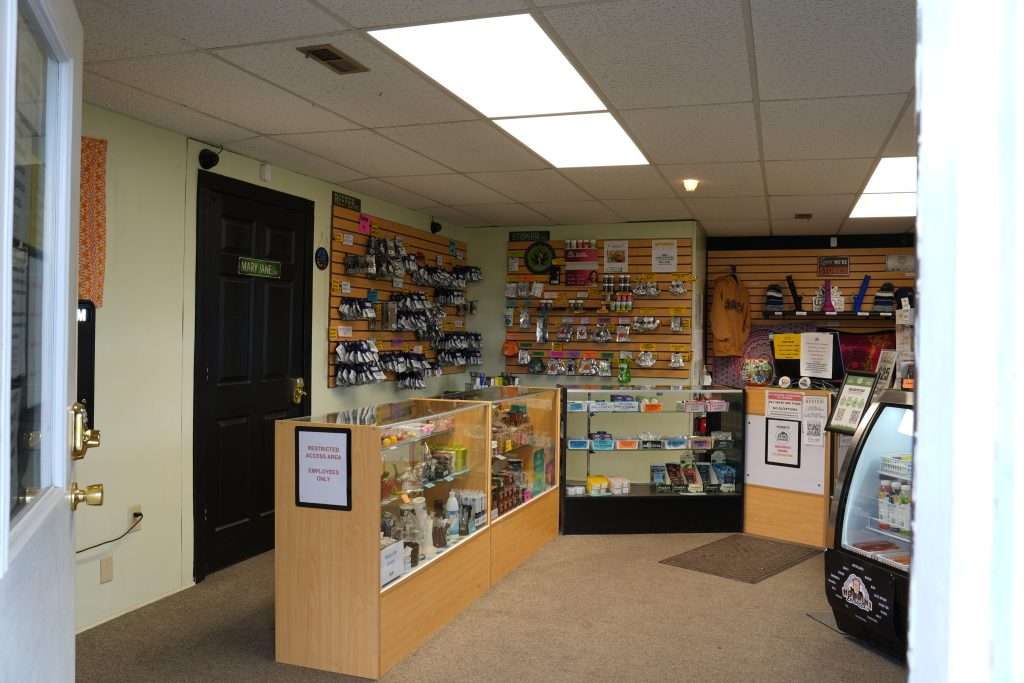 Interior of Polson dispensary, featuring premium cannabis products like flower, concentrates, edibles, and accessories.