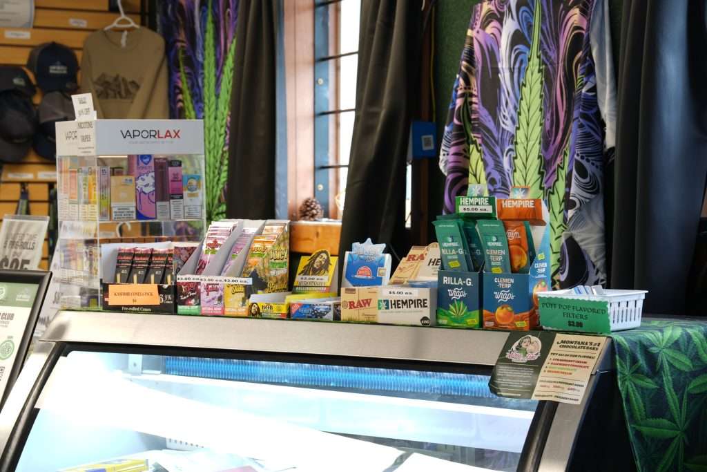 Interior of Polson dispensary, featuring premium cannabis products like flower, concentrates, edibles, and accessories.