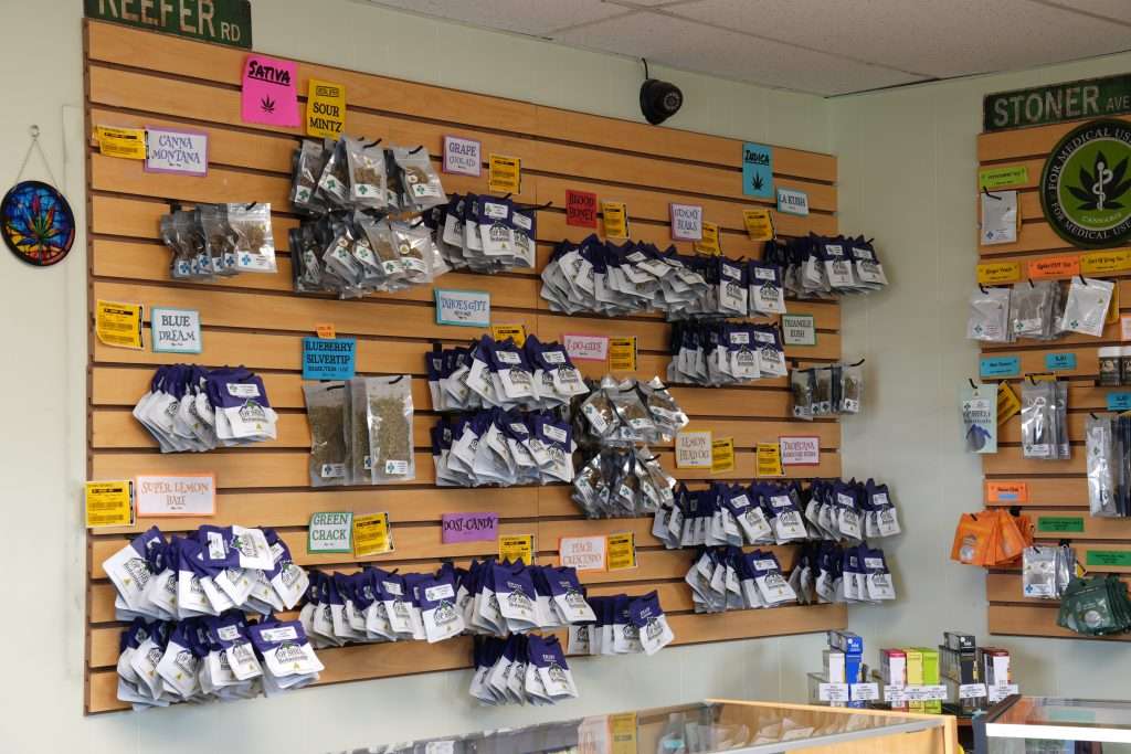 Interior of Polson dispensary, featuring premium cannabis products like flower, concentrates, edibles, and accessories.