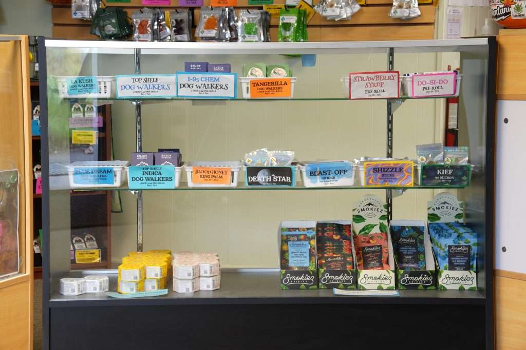 Interior of Polson dispensary, featuring premium cannabis products like flower, concentrates, edibles, and accessories.