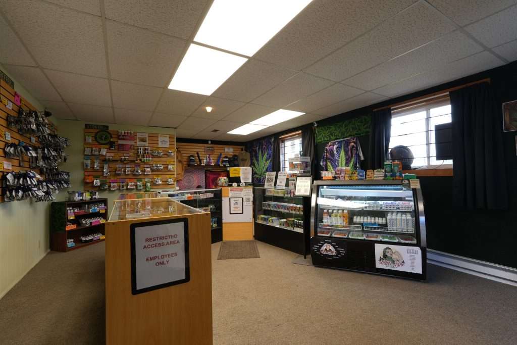 Interior of Polson dispensary, featuring premium cannabis products like flower, concentrates, edibles, and accessories.