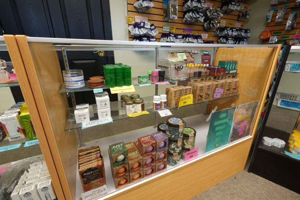 Interior of Polson dispensary, featuring premium cannabis products like flower, concentrates, edibles, and accessories.