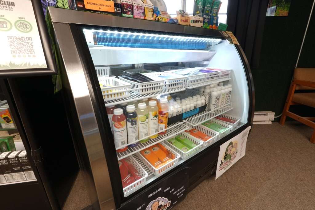 Interior of Polson dispensary, featuring premium cannabis products like flower, concentrates, edibles, and accessories.